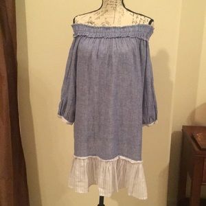 Off the shoulder light blue dress with frayed trim